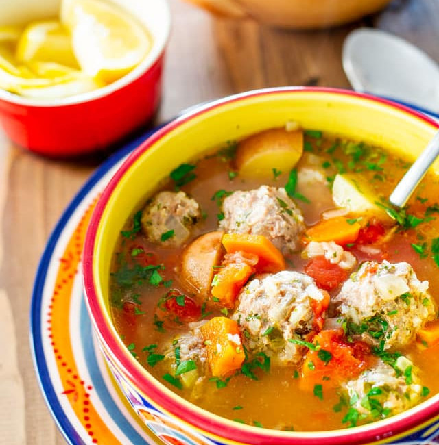 side view shot of a bowl full of albondigas soup