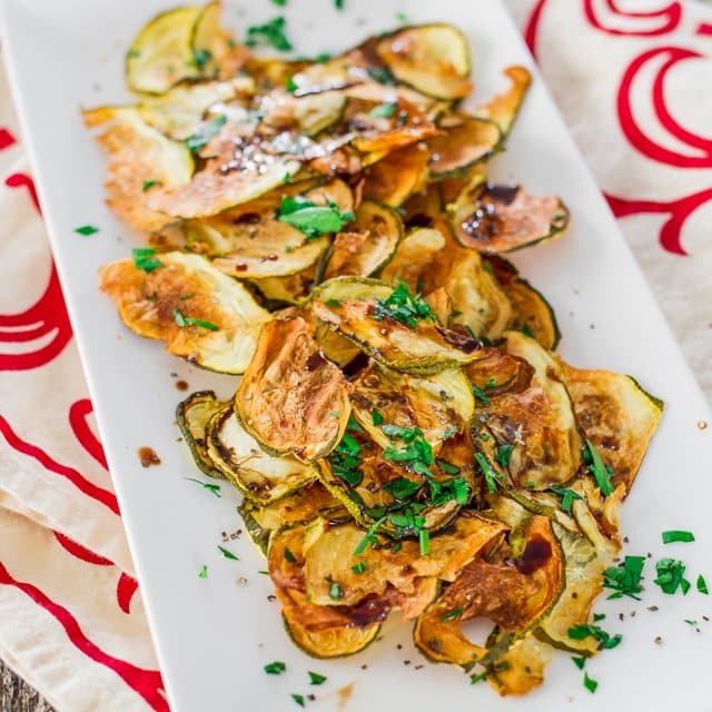 Baked Zucchini Chips on a rectangular plate