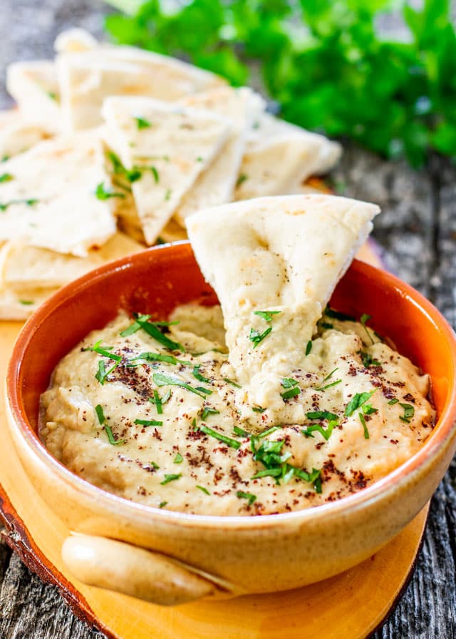 baba ganoush in a bowl with pita chips