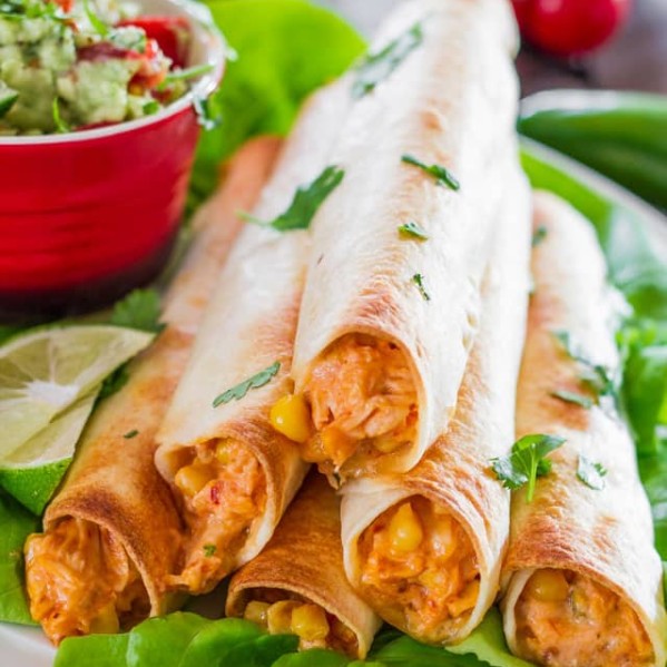 a pyramid stack of cheesy chicken flautas