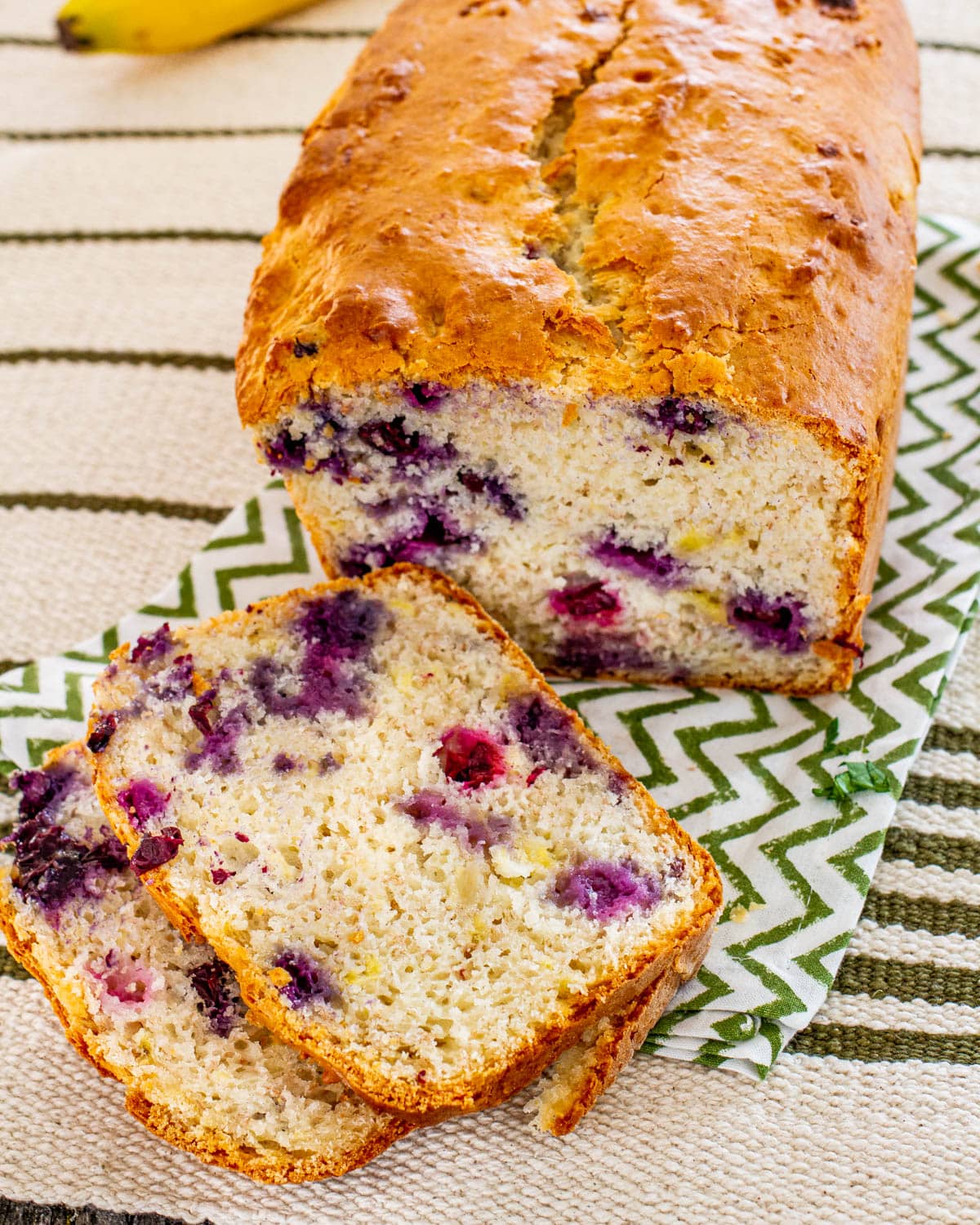 blueberry banana bread with 2 slices cut up