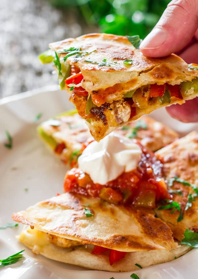 Chicken Fajita Quesadillas - sautéed onions, red and green peppers, perfectly seasoned chicken breast, melted cheese, between two tortillas. Simply yummy.