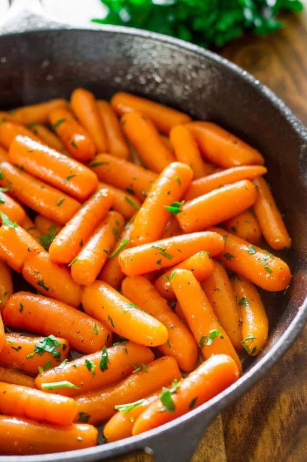 brandy glazed carrots in a skillet