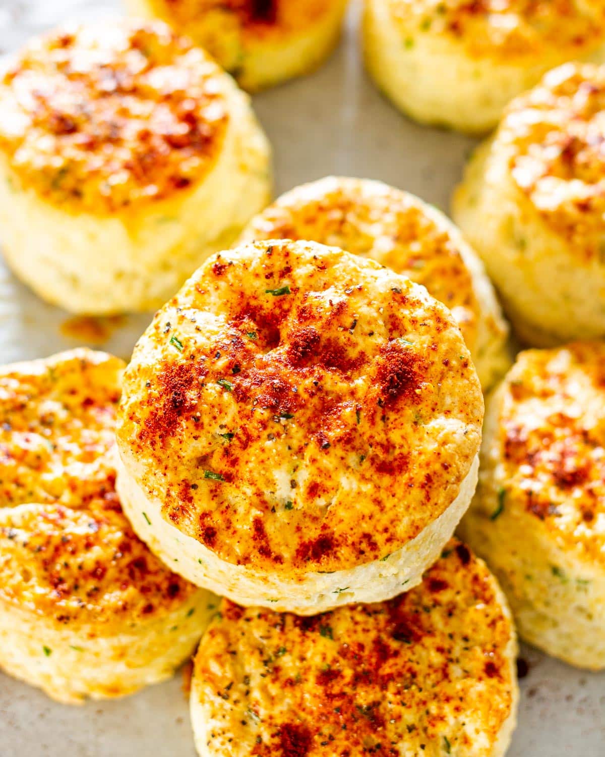 overheat shot of a bunch of feta cheese biscuits