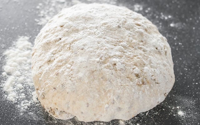 Process shot making Sunflower and Flax Seeds Whole Wheat Cast Iron Bread