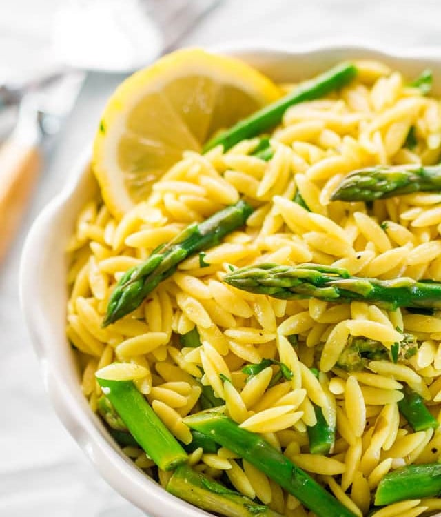 lemon orzo with asparagus in a bowl