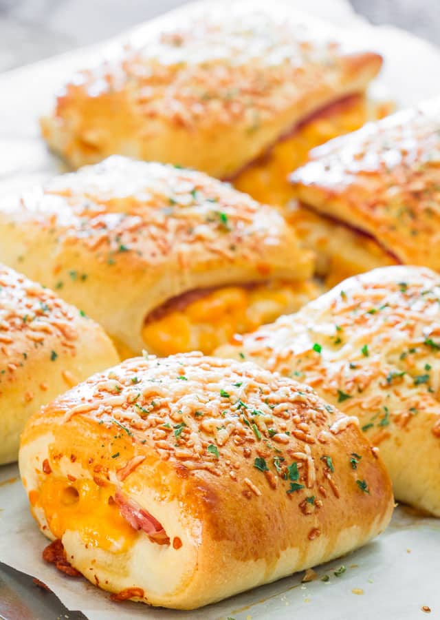 Ham and Cheese Pockets fresh out of the oven on a baking sheet
