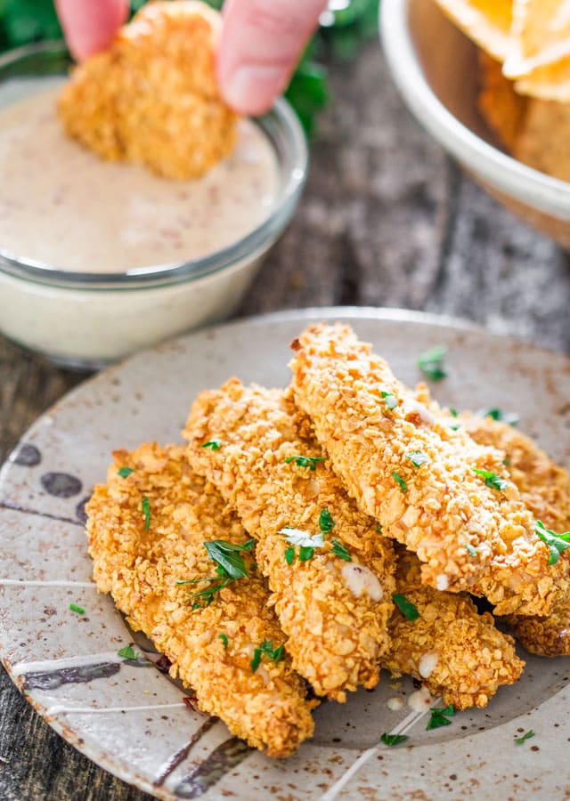 Oven Fried Breaded Chicken Tenders with Maple Mustard Dipping Sauce - a simple recipe for delicious crispy baked chicken tenders.