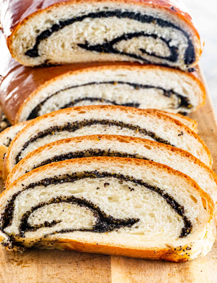 front shot of sliced poppy seed roll with the beautiful swirls exposed