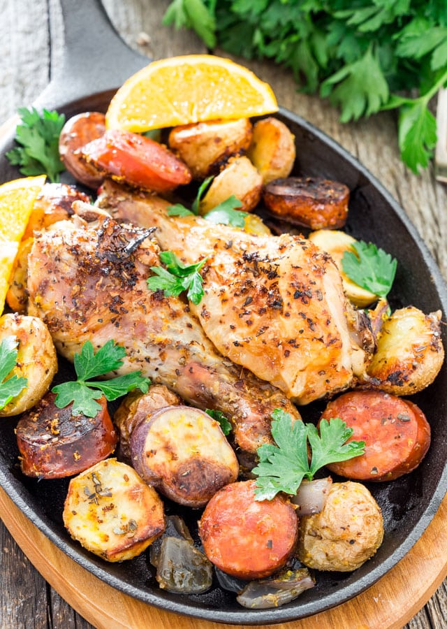 Spanish Chicken with Chorizo and Potatoes in a small skillet garnished with parsley