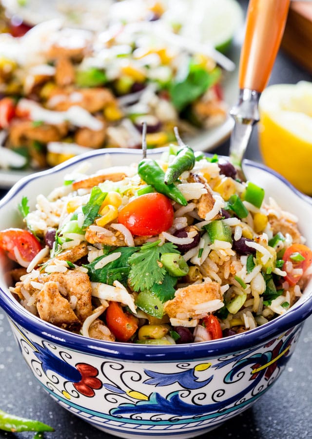 Mexican Chicken and Rice Salad in a bowl with a fork in it