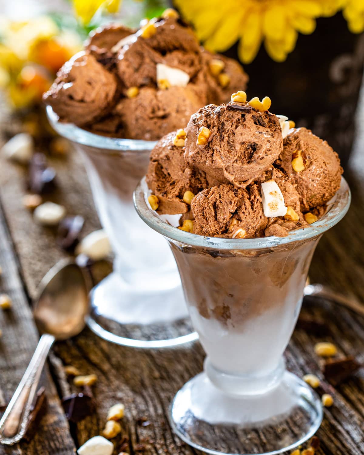 two beautiful ice cream cups topped with homemade rocky road ice cream