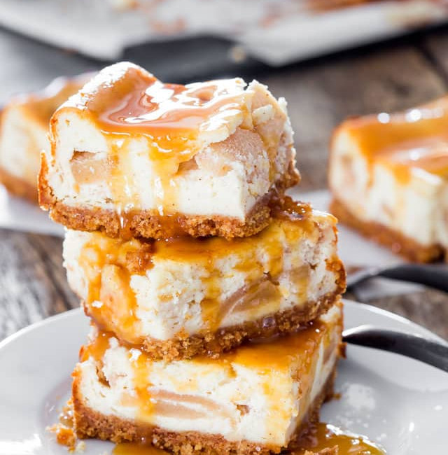 a stack of salted caramel apple pie cheesecake squares