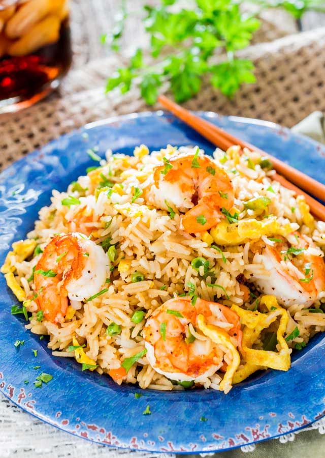 shrimp fried rice in a blue plate