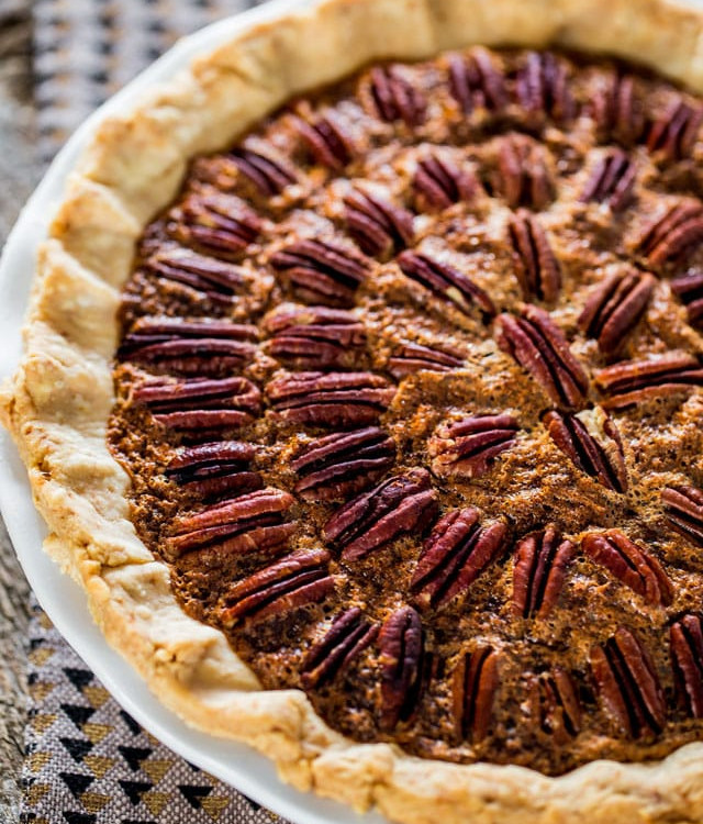 a freshly baked whole bourbon pecan pie