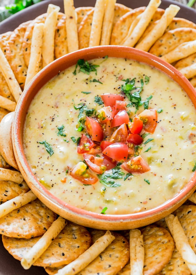 Crockpot Bacon Queso Blanco Dip in a plate with crackers