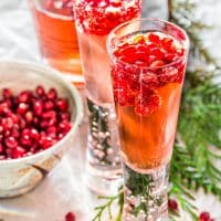 3 glasses of pomegranate elderflower cocktails