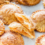 churro apple pie cookies with one split in half exposing the center