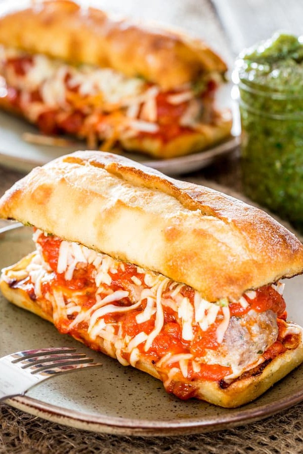 side view shot of a meatball sub on a plate