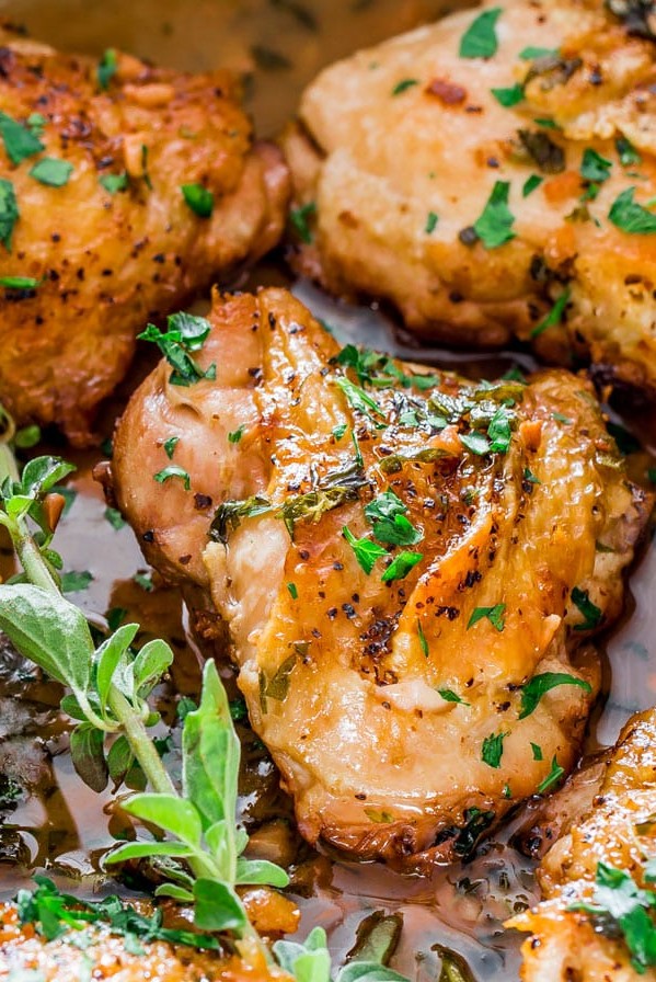 close up shot of chicken in garlic and herb sauce