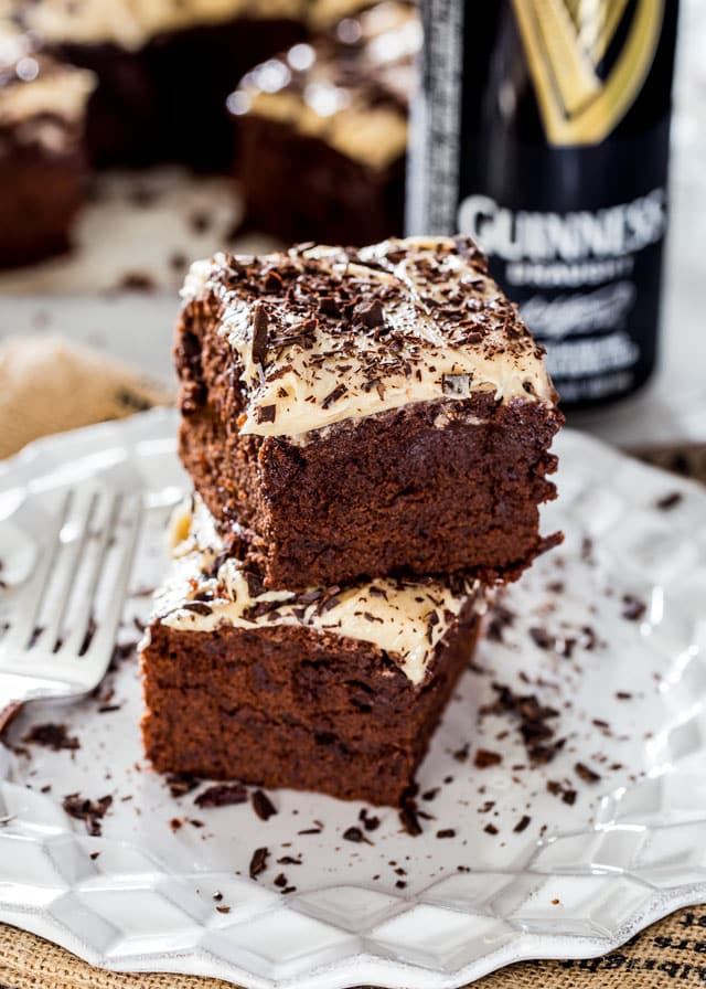 two Guinness Brownies topped with buttercream stacked on each other
