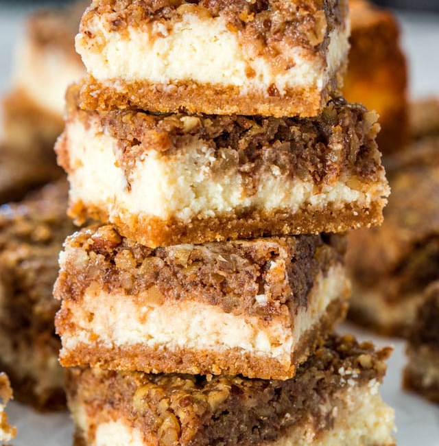 side view stack of a shot of pecan pie cheesecake bars