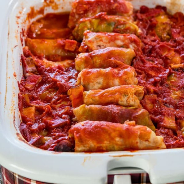 side view shot of cabbage rolls in a crockpot