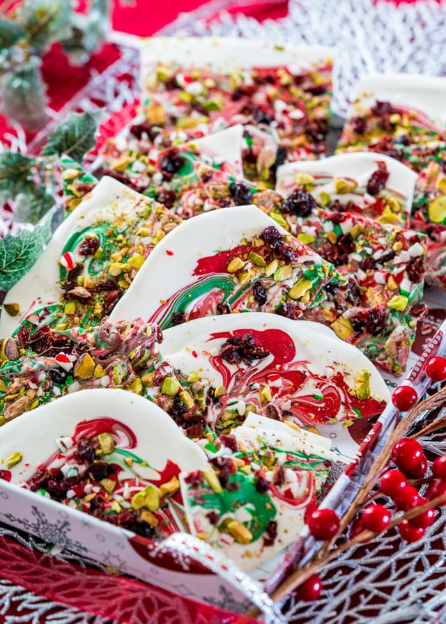 pieces of candy can chocolate bark in a decorative christmas sleigh