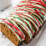 top shot of a sliced gingerbread loaf with cream cheese icing