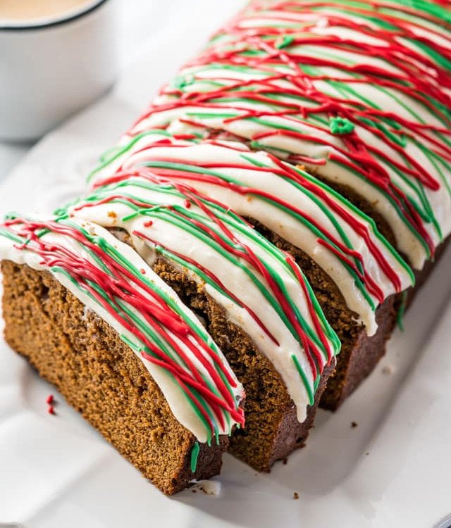 top shot of a sliced gingerbread loaf with cream cheese icing