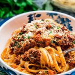 side view shot of a bowl of braised beef ragu fettuccine