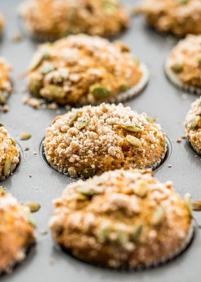 muffins with a crunchy topping fresh out of the oven in a muffin tin