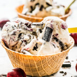 side view shot of a waffle cone bowl full of no churn cherry chocolate ice cream