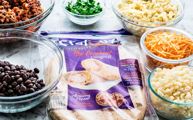 a package of Flatout wraps surrounded by tex mex ingredients
