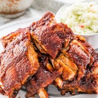 side view shot of instant pot bbq pork ribs on a plate