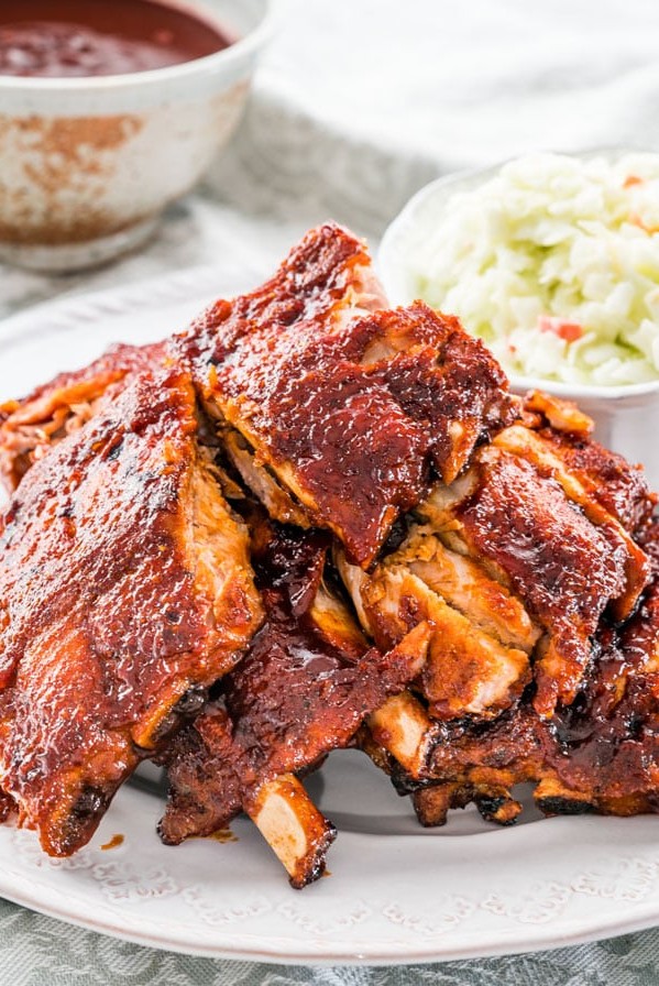 side view shot of instant pot bbq pork ribs on a plate