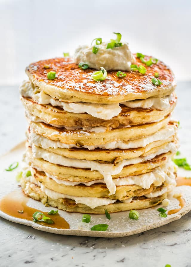 A stack of Jalapeno Popper Pancakes topped with green onions