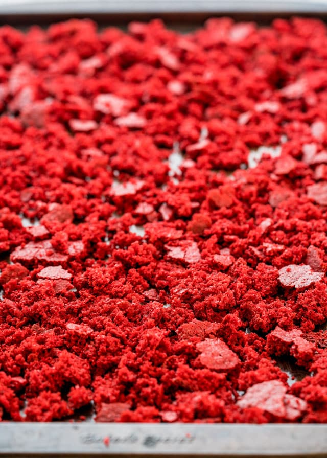 Toasted Red Velour Cake crumbs on a pan