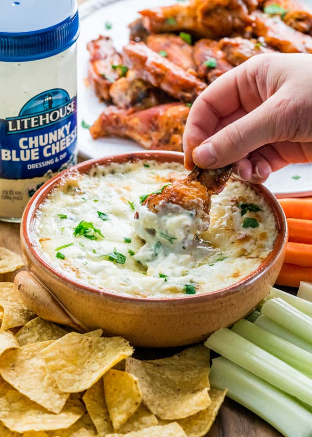 When it comes to the big game, wings are the ideal snack which is why I have for you THE ULTIMATE BLUE CHEESE BUFFALO WINGS with my special blue cheese dip, both made with Litehouse Chunky Blue Cheese dressing. Did you know Litehouse dressings are refrigerated, taste incredible and are made without artificial colors, flavors or preservatives! Follow @litehousefoods for lots more. #LitehouseFoods