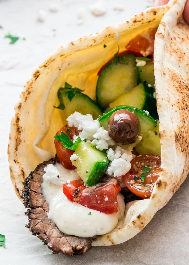 Beef Brisket Gyros wrapped in pita with olives