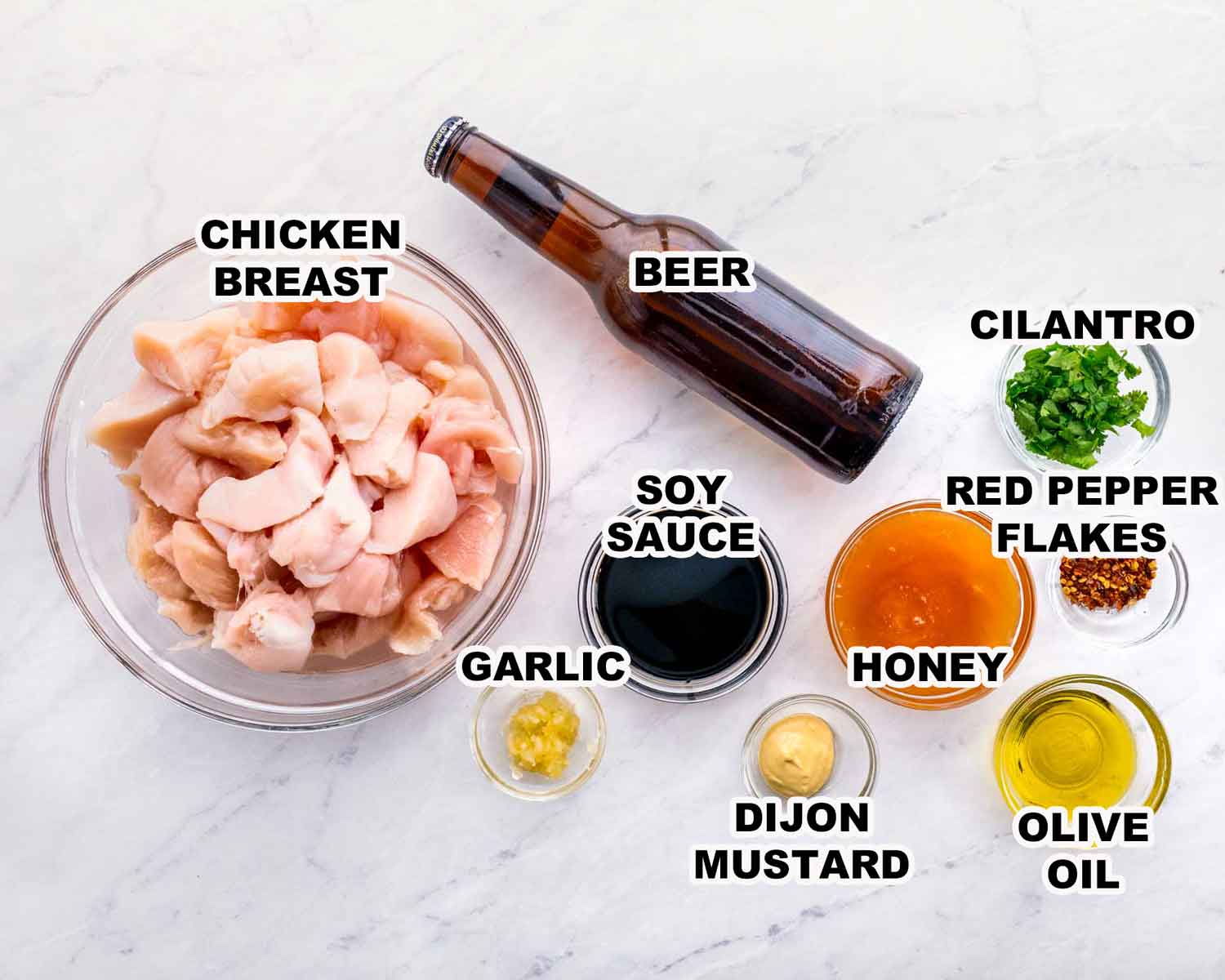 ingredients needed to make honey beer bbq chicken skewers.