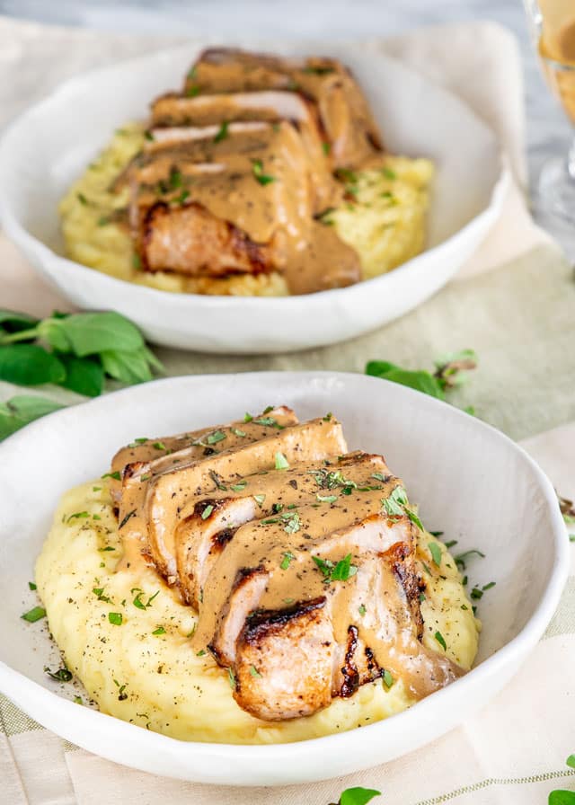Pan Seared Pork Chops with Gravy over mashed potatoes