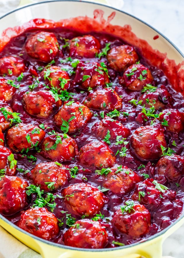 Cranberry Meatballs in a yellow skillet