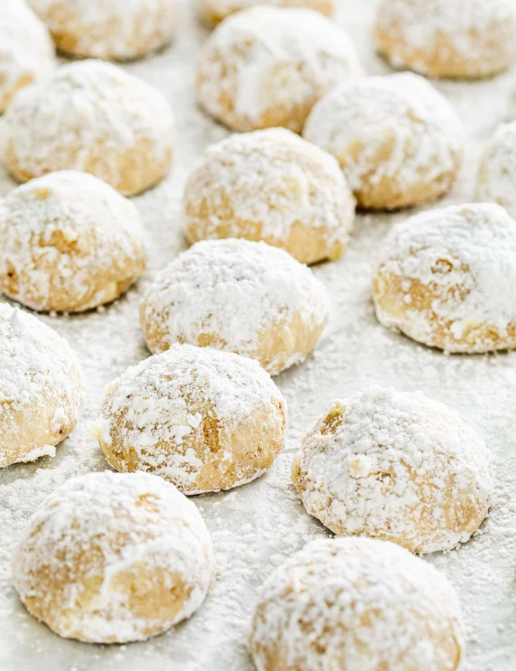 mexican wedding cookies on parchment paper.