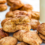 a few snickerdoodles stacked on top of each other with top on broken in half.