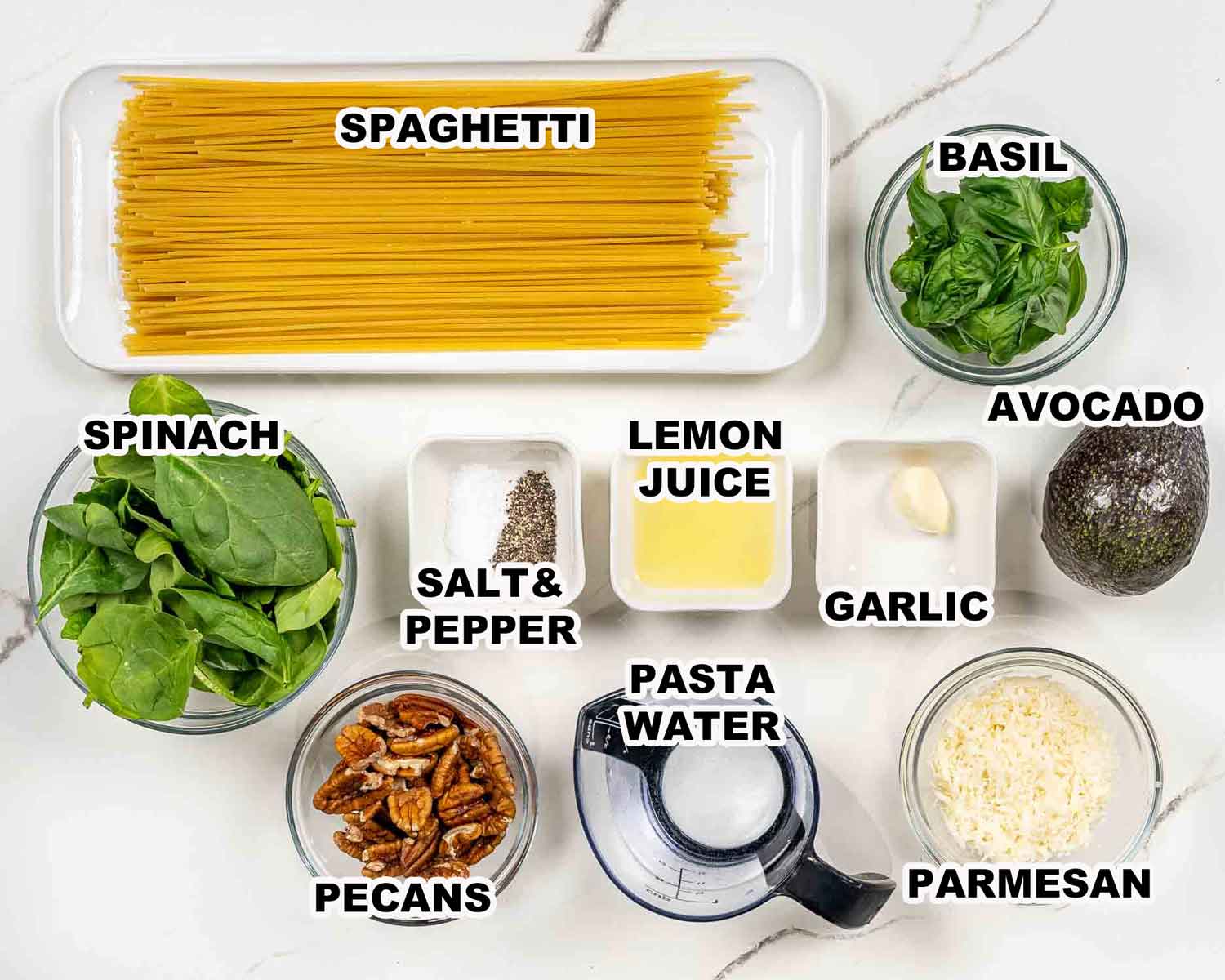ingredients needed to make creamy avocado spinach pasta.