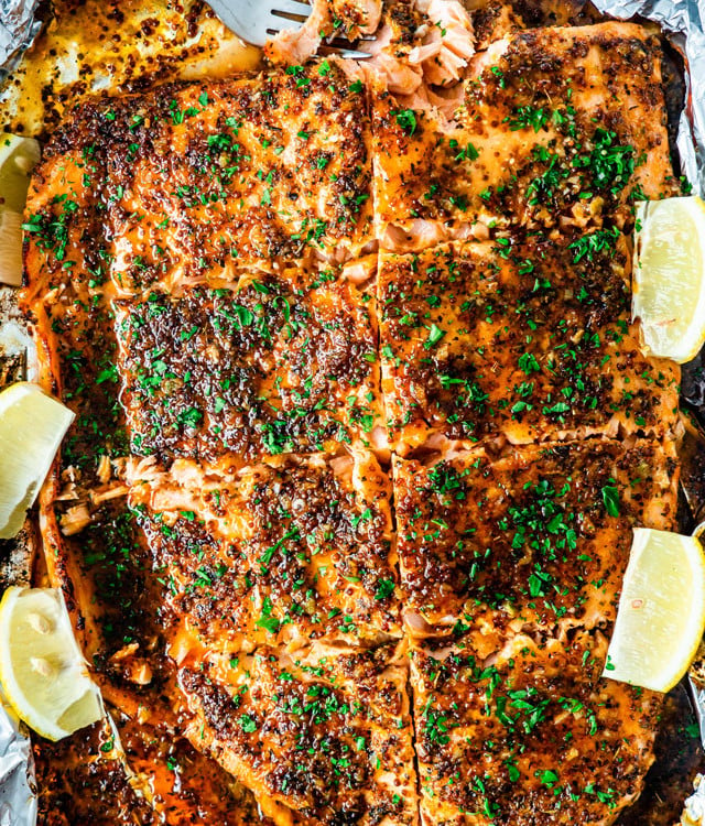 overhead shot of honey mustard salmon with a fork taking a bite
