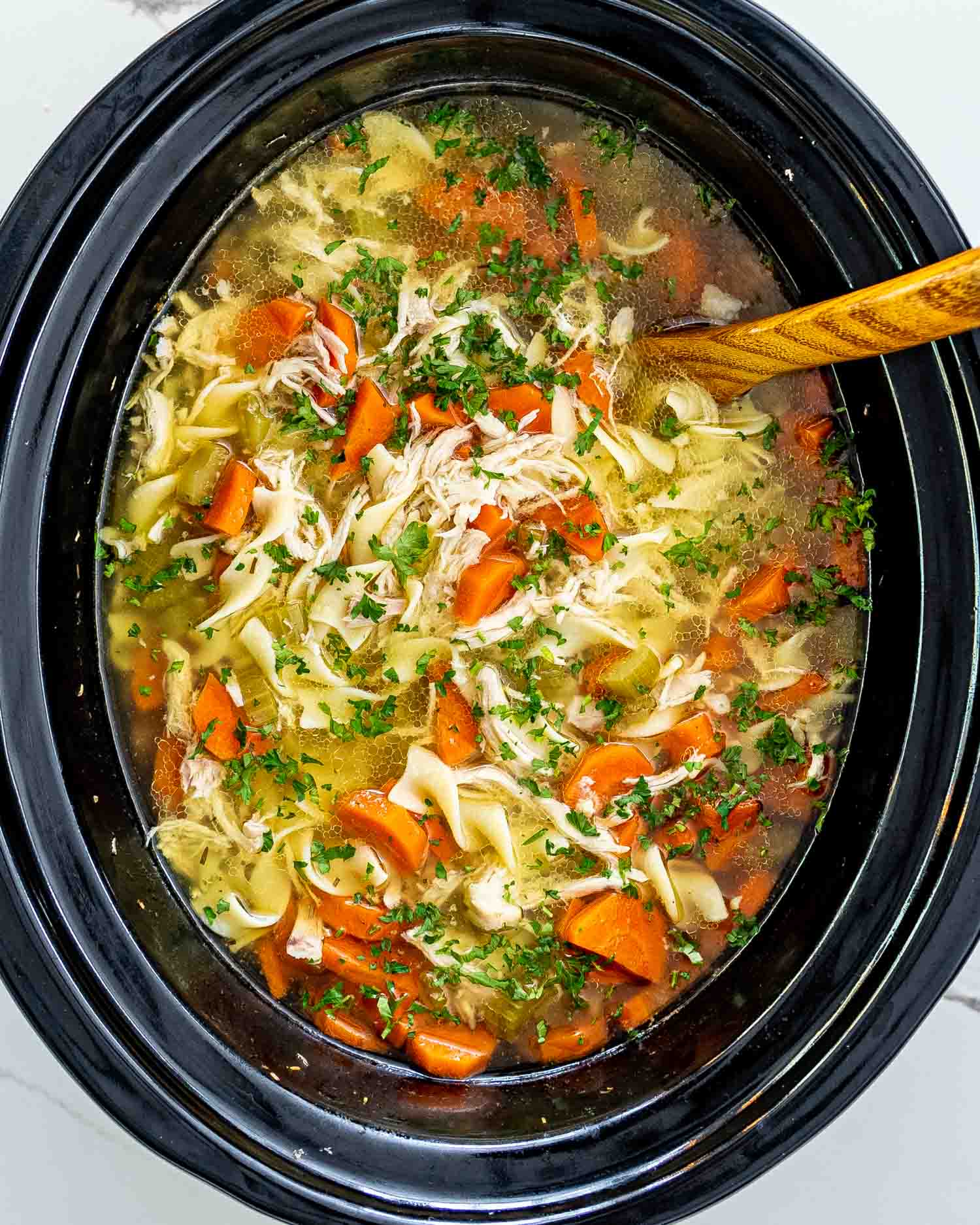 chicken noodle soup in a crockpot.
