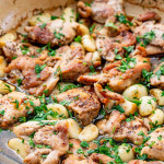 chicken with 40 cloves of garlic in a Dutch oven.