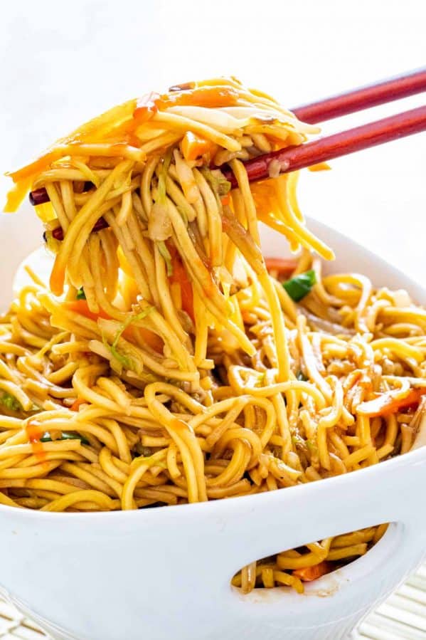 chow mein in a white asian bowl.